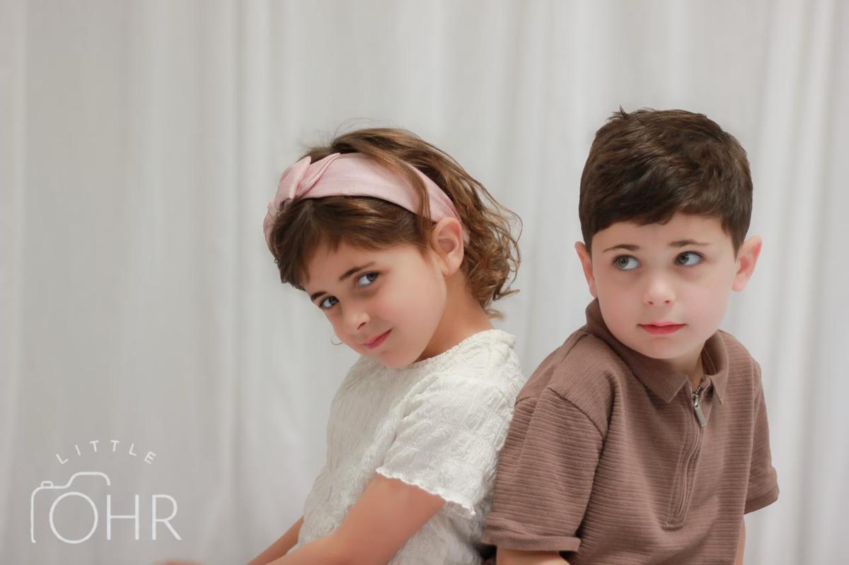 Brother and sister back to back